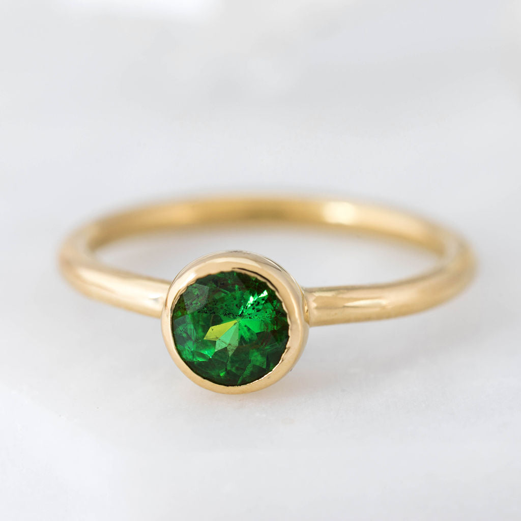 Gold with Tsavorite Garnet Nestle Ring