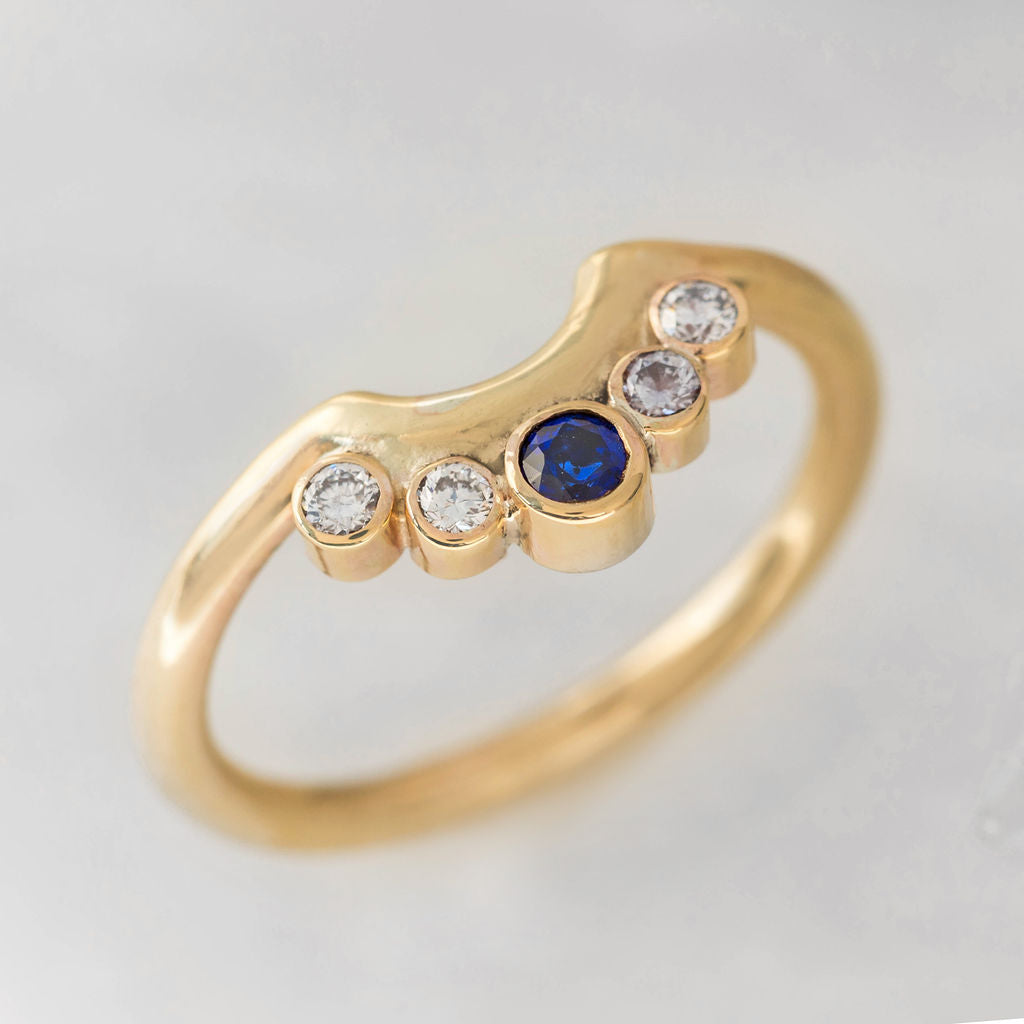 Gold Diamond and Sapphire Nestling Wedding Ring