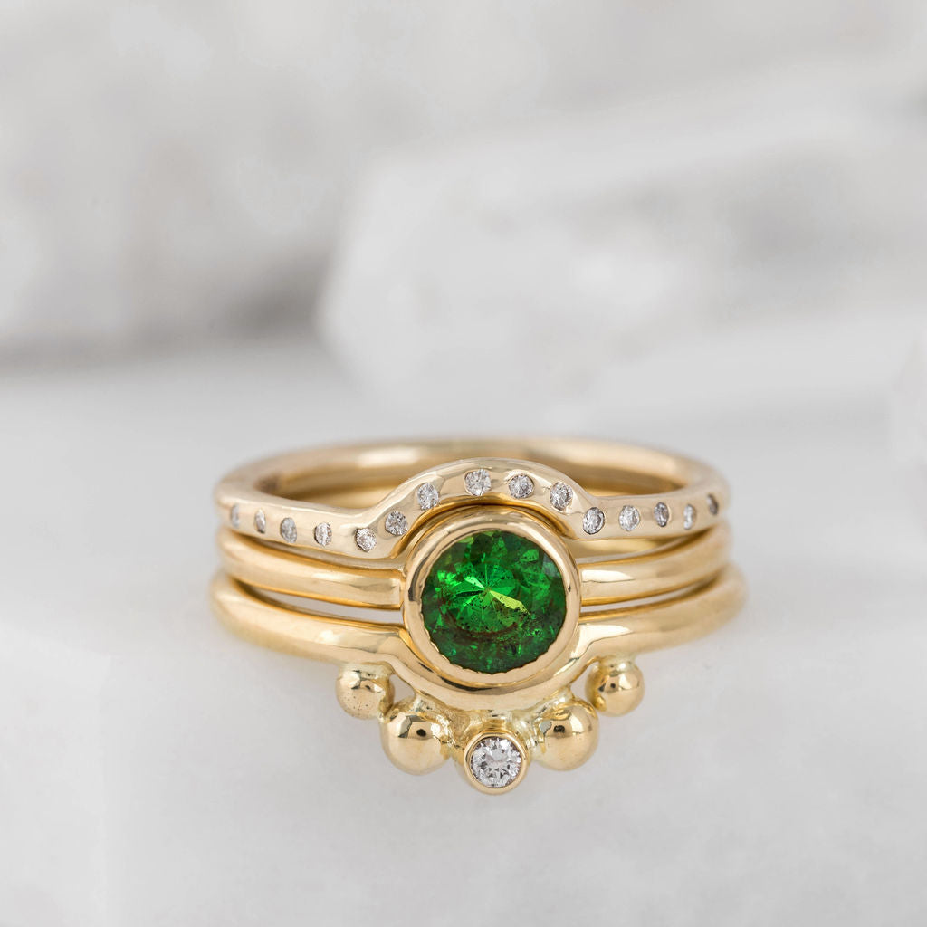 Gold with Tsavorite Garnet Nestle Ring