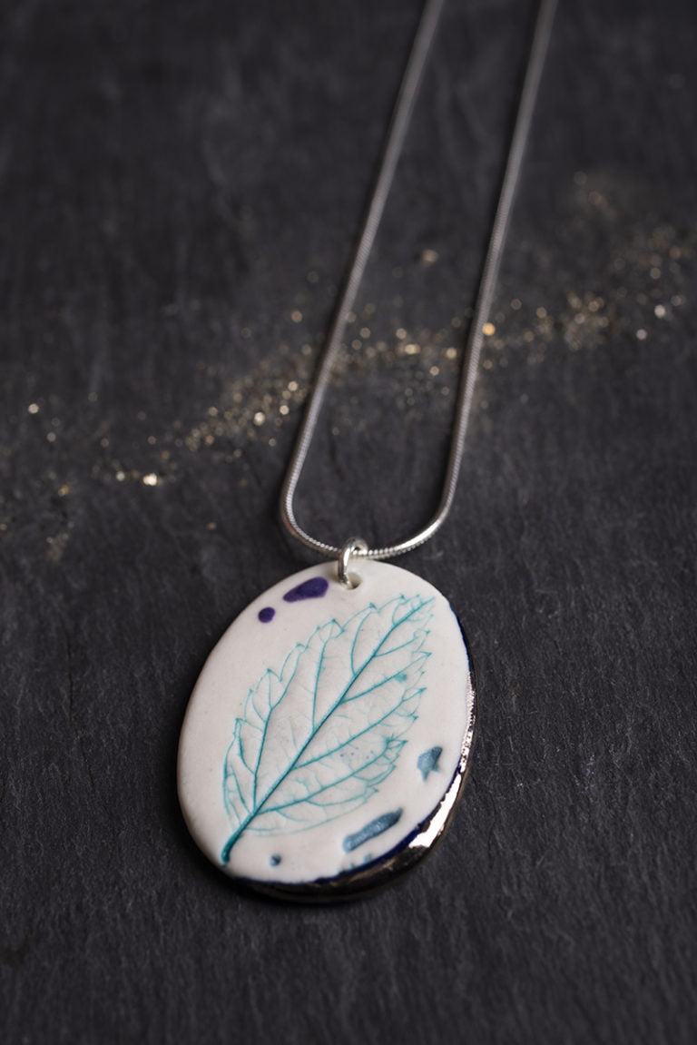 Leaf Print Necklace with Platinum Detailing